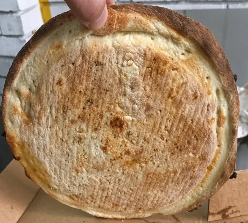 Cocción uniforme de pizzas en horno de banda transportador continuo